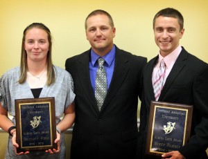 The 2013 recipients of the Auburn Smith Award were Brittany Wood, left, and Mickey Hammer, right. They are pictured with SAU Athletic Director Steve Browning.