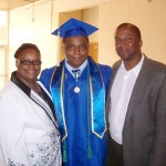 Cameron Sumlin poses for a graduation photo with his parents, Sabrina and Jeffery Sumlin.