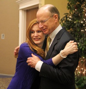 Dr. Rankin is embraced by his daughter, Beth Anne, following his retirement announcement.