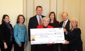Members of the Lusby and Winning families recently give the largest gift the SAU Alumni Association has ever received to SAU President Dr. David Rankin, second from right, and SAU Alumni Director Ceil Bridges, right, in order to name the planned Alumni pavilion “The Lusby Gathering Pavilion.” The gift is from Kyle and Laura Winning, back row center, in honor of Laura’s mother, Geraldine Tipton Lusby, holding check, and late father, Edsel Partee Lusby. Also pictured are SAU alum from the Lusby family Meghan Russell, from left, and Kerri Lusby Peden.
